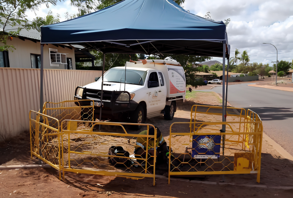 NBN work van and site with safety barriers on a Karratha street